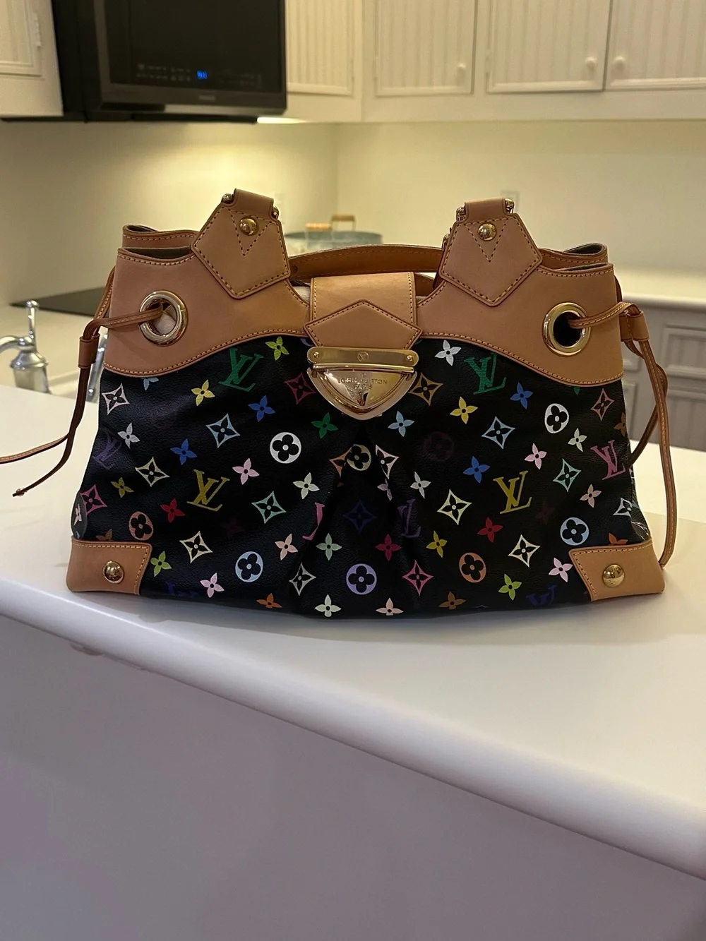 Louis Vuitton Limited Edition Light Beige Suede Interior- Classic Embossed Logo